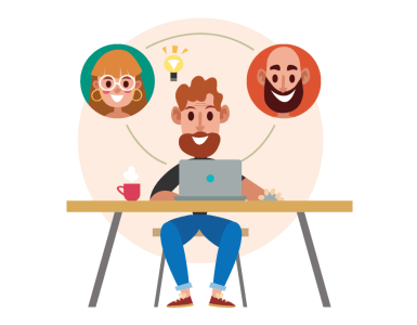 Creative team working together on a project at a desk.